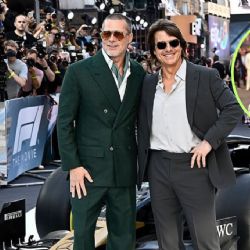 Brad Pitt y Tom Cruise juntos otra vez: el reencuentro que encendió la alfombra roja de F1