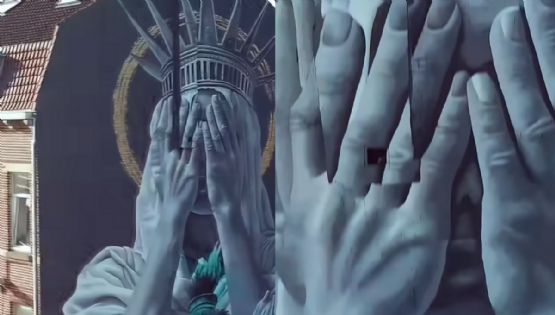 ¿La Estatua de la Libertad, avergonzada? Un mural en Francia lanza crítica a EU | VIDEO